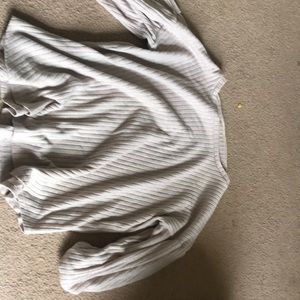 I have an oversized tan sweater that is also sparkly.